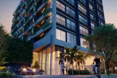 render fachada frontal edifício 10 andares revestimento pedra varandas plantas portaria logo Playa Negra carro bicicleta noturno — Playa Negra Residence em Agronômica, Florianópolis