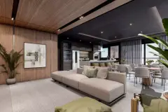 perspectiva ilustrativa salão festas gourmet sofá bege modular sofá verde cozinha escura ilha cadeiras mesa jantar planta teto madeira janela — Residencial Evora em Centro, Florianópolis