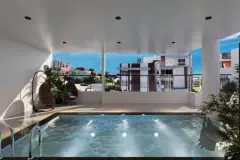 Área da piscina coberta com cadeiras suspensas de vime, piscina iluminada e vista para o bairro — Saint Humbert II em Ingleses, Florianópolis