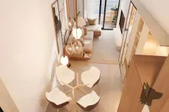 Sala de estar duplex com sofá bege, painel ripado e pé-direito duplo com varanda ao fundo — Saint Humbert II em Ingleses, Florianópolis