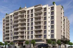 Fachada do edifício vista diagonal com varandas escalonadas e terraço ajardinado no topo — Saint Tropez Residence em Ingleses, Florianópolis