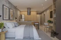 Estúdio decorado em ângulo alternativo com cama, ilha de cozinha com pendente e área de trabalho — Saint Zambelli em Ingleses, Florianópolis