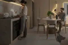 Cozinha com mulher cozinhando e homem à mesa de jantar, luminária pendente e decoração amadeirada — Saint Zambelli em Ingleses, Florianópolis