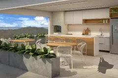 Espaço gourmet aberto com mesas redondas de madeira, bancada de cozinha e vista para as montanhas — Santa 4 em Santa Mônica, Florianópolis