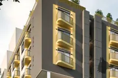 Detalhe de varandas arredondadas amarelas iluminadas na fachada do STA4 ao entardecer — Santa 4 em Santa Mônica, Florianópolis