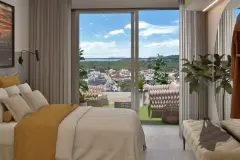 Suíte com cama de casal e colcha mostarda, varanda com poltronas e vista panorâmica da cidade — Santa 4 em Santa Mônica, Florianópolis