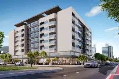 Fachada frontal do Seleto Carlessi, edifício de 8 andares com fachada clara, vista diagonal — Seleto Carlessi em Trindade, Florianópolis