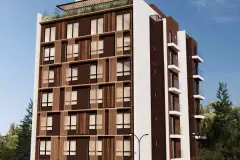 Fachada do edifício em perspectiva ampla com revestimento marrom chocolate, ripas de madeira e jardim no topo — Smart 1 Trindade em Trindade, Florianópolis