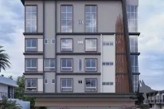 Fachada frontal do edifício com acabamento cinza e detalhe em ripas de madeira — Solis em Ingleses, Florianópolis