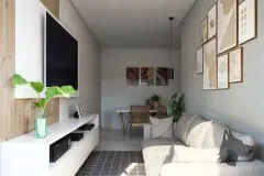 Sala de estar com sofá bege, rack branco com TV, mesa de jantar ao fundo e quadros decorativos — Solis em Ingleses, Florianópolis