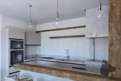 Cozinha com armários brancos, bancada de mármore, prateleiras de madeira rústica e luminárias de vidro — Solis em Ingleses, Florianópolis