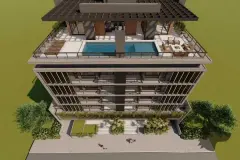 Vista aérea em perspectiva do edifício mostrando rooftop com piscina e área de lazer — Sungarden Beach Home em Cachoeira do Bom Jesus, Florianópolis