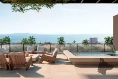 Terraço com poltronas de madeira, fire pit e piscina com panorama para o oceano — Sungarden Beach Home em Cachoeira do Bom Jesus, Florianópolis