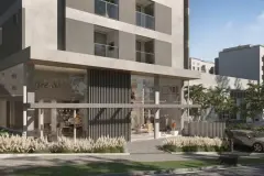Térreo do edifício com loja no nível da rua e fachada de ripas metálicas cinzas — Torres do Porto em Estreito, Florianópolis