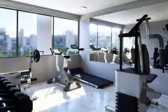 Academia com esteiras, bicicleta, aparelhos de musculação e janelas com vista para a cidade — Tramonto em Ingleses, Florianópolis