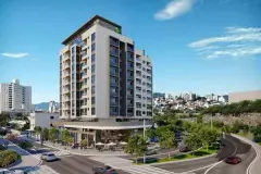 Fachada do edifício de 12 andares em esquina com loja no térreo e rua movimentada — Unity em Estreito, Florianópolis