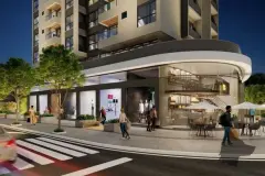 Térreo comercial à noite com lojas, café com mesas externas e pedestres — Unity em Estreito, Florianópolis