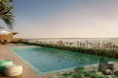 Piscina de borda infinita no rooftop com vista panorâmica para o centro e a baía — Unity em Estreito, Florianópolis