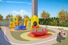Playground externo com escorregador, casinha e equipamentos coloridos com jardim ao redor — Unity em Estreito, Florianópolis