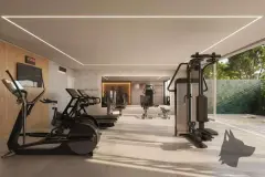 Academia com elíptico, esteira e aparelhos de musculação com janela para o jardim — Upside Beach em Ponta das Canas, Florianópolis