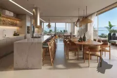 Cozinha gourmet com ilha de mármore, mesa de jantar oval, cadeiras rattan e vista para o mar — Upside Beach em Ponta das Canas, Florianópolis