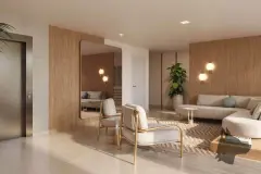Hall de entrada com sofás, poltrona, espelho arco, luminária e revestimento de madeira — Upside Beach em Ponta das Canas, Florianópolis