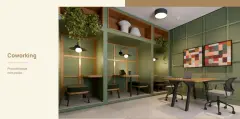Espaço de coworking com nichos verdes individuais iluminados, mesa de reuniões redonda e quadros coloridos na parede — Vergê en Campeche, Florianópolis