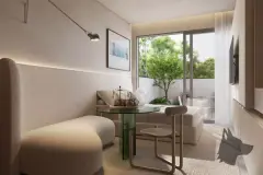 Sala compacta com sofá banco integrado, mesa redonda de vidro verde, TV na parede e janela para jardim privativo — Verset em Campeche, Florianópolis