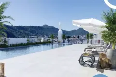 Piscina no rooftop com espreguiçadeiras e guarda-sol branco, vista para o morro ao fundo — Viel Spaβ em Ingleses, Florianópolis