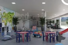 Brinquedoteca interna com mesas e cadeiras infantis coloridas, escorregador vermelho e painel mapa-múndi — Viel Spaβ em Ingleses, Florianópolis