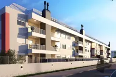 Fachada frontal do edifício com 3 andares, varandas com guarda-corpo de vidro e painéis solares no telhado — Viel Spaβ em Ingleses, Florianópolis