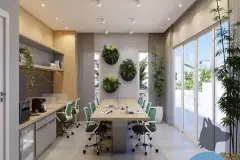 Espaço coworking com mesa longa, cadeiras com rodinhas verdes, vasos jardim esféricos na parede e bambus — Viel Spaβ em Ingleses, Florianópolis
