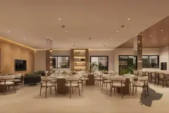 Salão de festas amplo com mesas redondas, cadeiras, sofá lounge, TV e estante com plantas decorativas — Villa Maggiore em João Paulo, Florianópolis