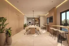 Espaço coworking com mesa de reunião longa, bancada com bancos altos, TV e área para café — Villa Maggiore em João Paulo, Florianópolis