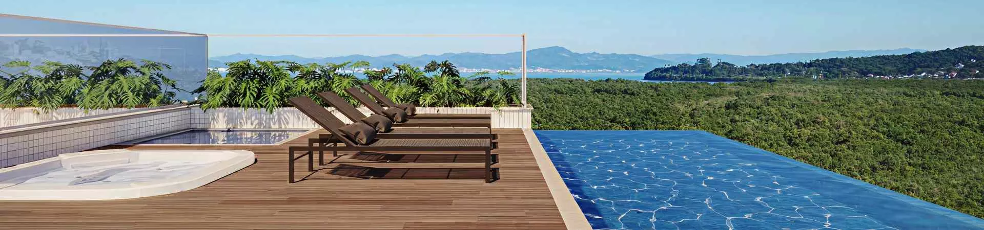Piscina infinity no rooftop com deck de madeira, espreguiçadeiras, hidromassagem e vista panorâmica para a baía — Vision 1617 em Saco Grande, Florianópolis