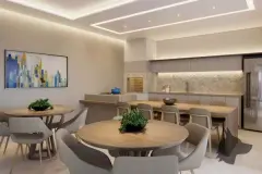 Salão de festas com mesas redondas de jantar, cozinha gourmet integrada e iluminação de forro — Vision 1617 em Saco Grande, Florianópolis
