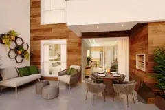 Terraço garden do apartamento com sofá, cadeiras, mesa de jantar redonda e parede revestida de madeira — Vision 1617 em Saco Grande, Florianópolis