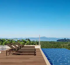 Rooftop com espreguiçadeiras e piscina infinity com vista panorâmica para a baía e morros — Vision 1617 em Saco Grande, Florianópolis