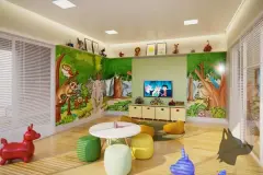 Brinquedoteca com mural de selva colorido, móveis infantis, TV e brinquedos — Vision 1617 em Saco Grande, Florianópolis