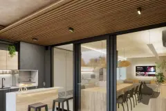 Varanda gourmet com churrasqueira, bancada de bar com banquetas, teto ripado de madeira e portas de vidro para a sala — Viva Balneário Estreito em Balneário, Florianópolis