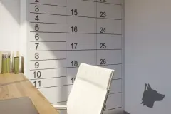 Detalhe do coworking com cadeira de escritório e painel numerado de lockers na parede — VYU One em Coqueiros, Florianópolis