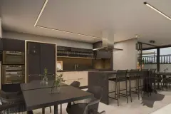 Interior do salão gourmet com cozinha escura equipada, ilha com bancos, mesa e janela com vista exterior — VYU One em Coqueiros, Florianópolis
