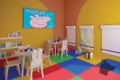 Brinquedoteca infantil colorida com mesas, cadeiras com orelhas de coelho, TV e tapete emborrachado colorido — VYU One em Coqueiros, Florianópolis