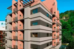 Fachada lateral do edifício VYU Pulse com revestimento de tijolinho aparente e varandas — VYU Pulse em Coqueiros, Florianópolis