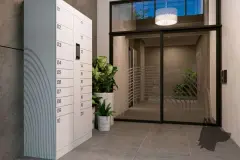 Hall de entrada com armário inteligente de lockers numerados, plantas e porta de vidro iluminada — VYU Pulse em Coqueiros, Florianópolis