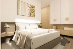 Suíte com cama de casal, painel de TV em madeira e closet de porta telada ao fundo — VYU Pulse em Coqueiros, Florianópolis