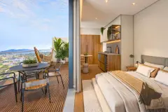 Studio integrado com quarto, cozinha em madeira e sacada com rede e vista para as montanhas — Yuná Blue View em Campeche, Florianópolis