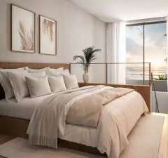Quarto de casal amplo com cama king, roupa bege, quadros de folhagem e janela com pôr do sol no mar — Yuná Blue View em Campeche, Florianópolis