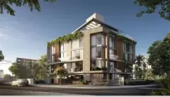 Fachada do edifício Yunic Haus ao entardecer em ângulo diagonal com revestimento em pedra e jardins — Yunic Haus Studios em Canasvieiras, Florianópolis