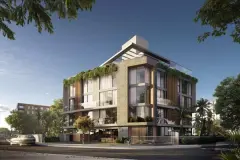 Fachada frontal do Yunic Haus em perspectiva com revestimento em pedra, varandas e vegetação — Yunic Haus Studios em Canasvieiras, Florianópolis